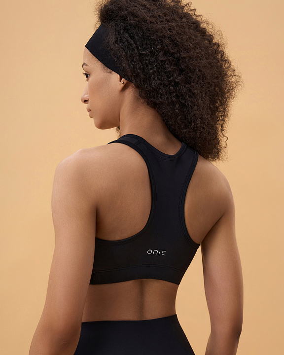 Топ спортивный средней поддержки "Triumph"